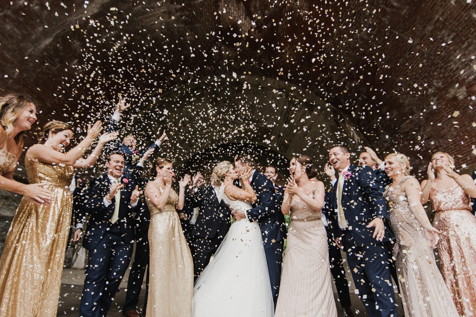 couple kisses under confetti at The Monastery Wedding - Cincinnati Wedding Photographer