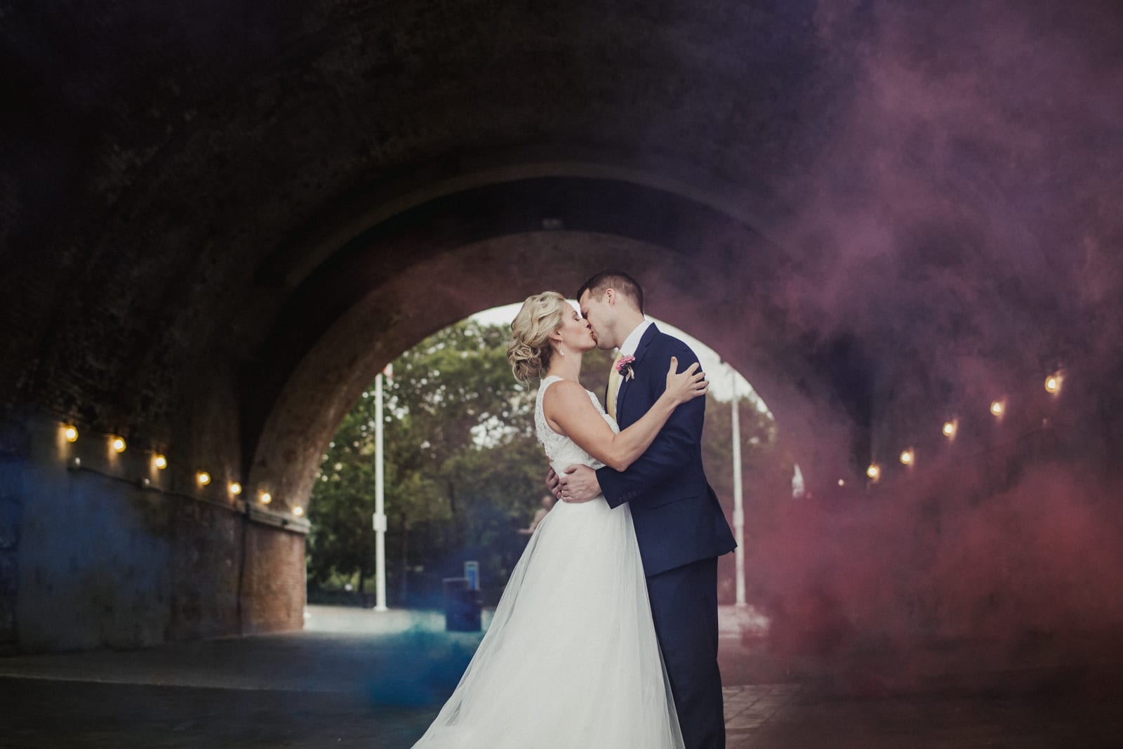 couple kisses in tunnel at The Monastery Wedding - Cincinnati Wedding Photographer
