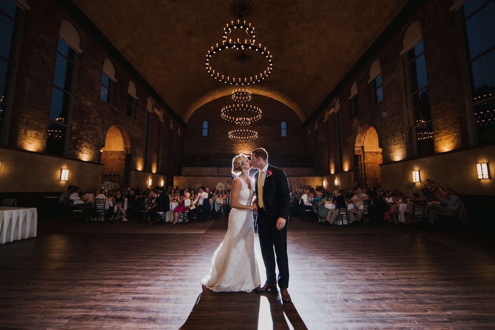 couple kisses on the dance floor \at The Monastery Wedding - Cincinnati Wedding Photographer