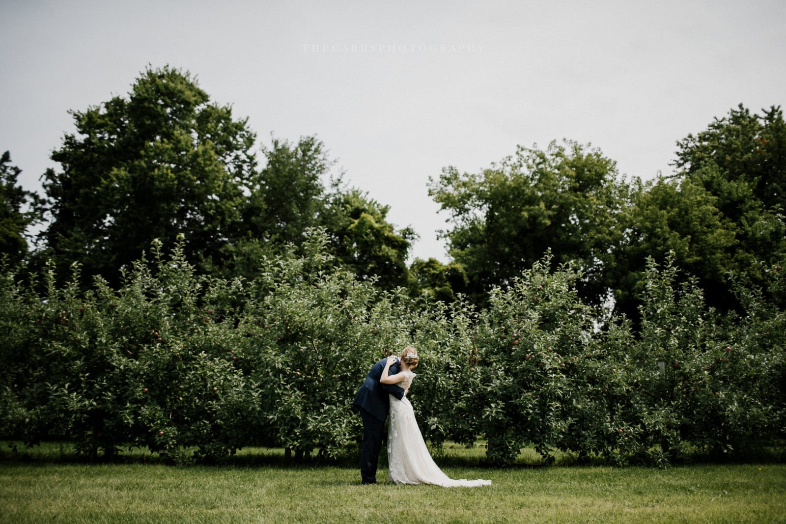 bride and groom kiss at Eckers Apple Farm Wedding - Destination Photographer