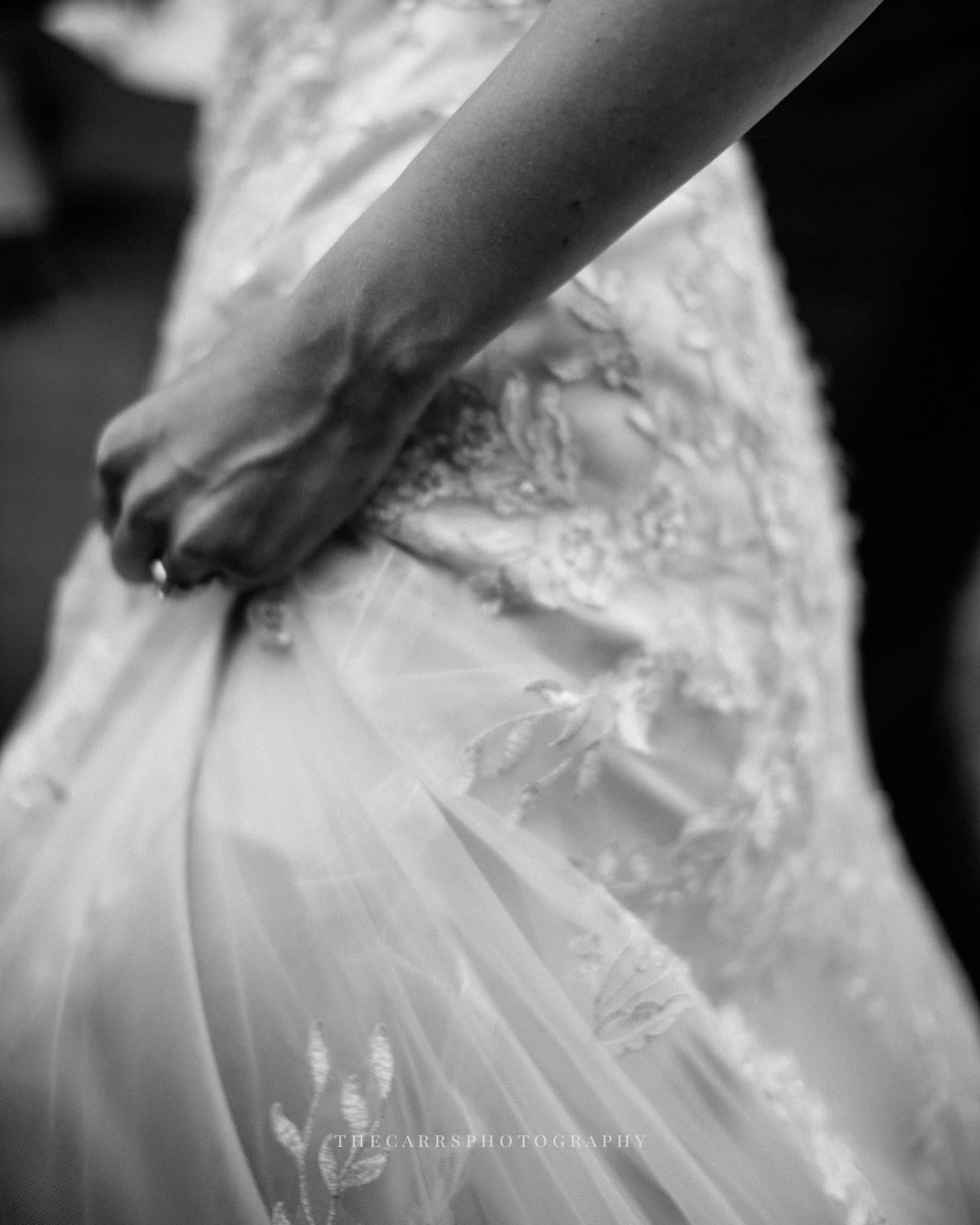 up close of brides dress at Eckers Apple Farm Wedding - Destination Photographer