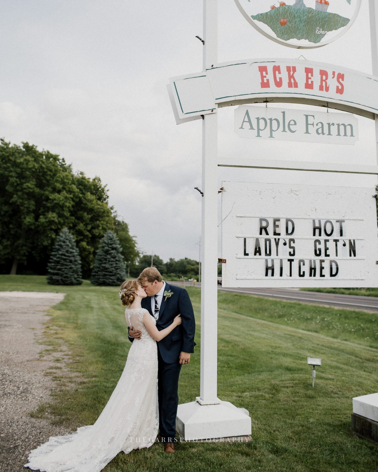 bride and groom kissing at Eckers Apple Farm Wedding - Destination Photographer