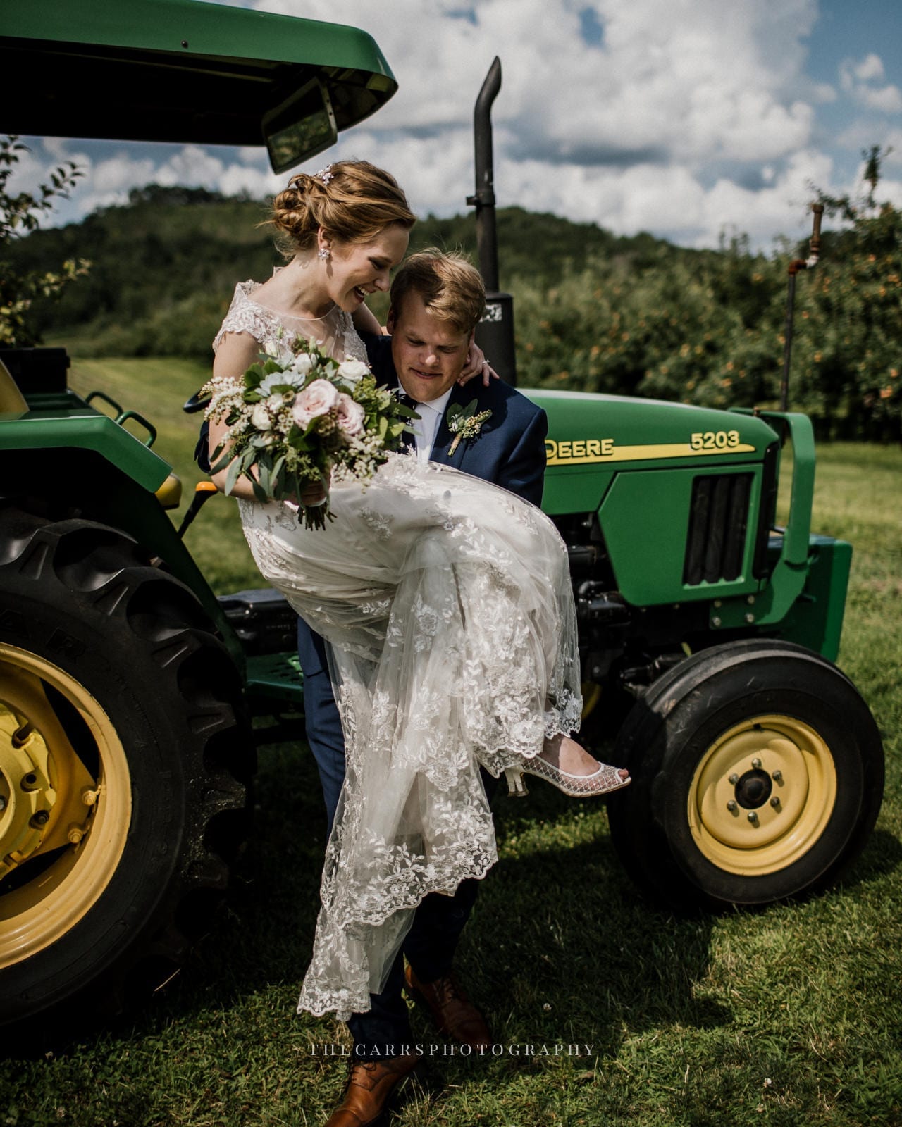 bride and groom with tractor at Eckers Apple Farm Wedding - Destination Photographer