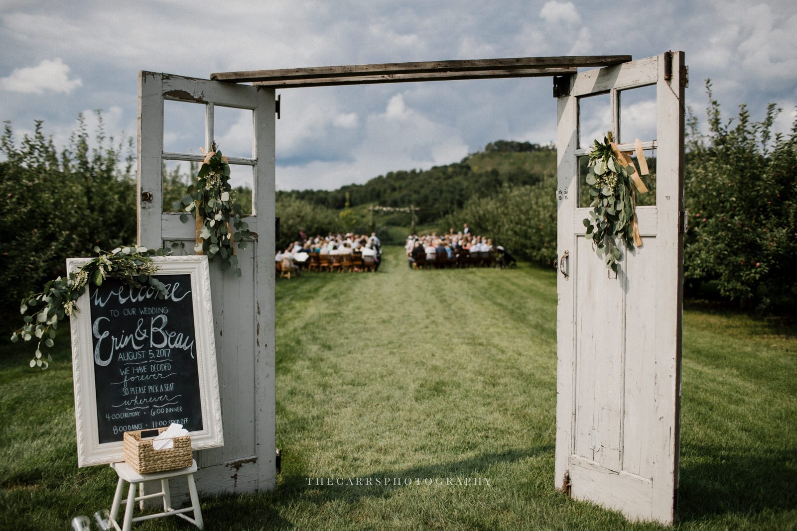 doors to outdoor ceremony at Eckers Apple Farm Wedding - Destination Photographer