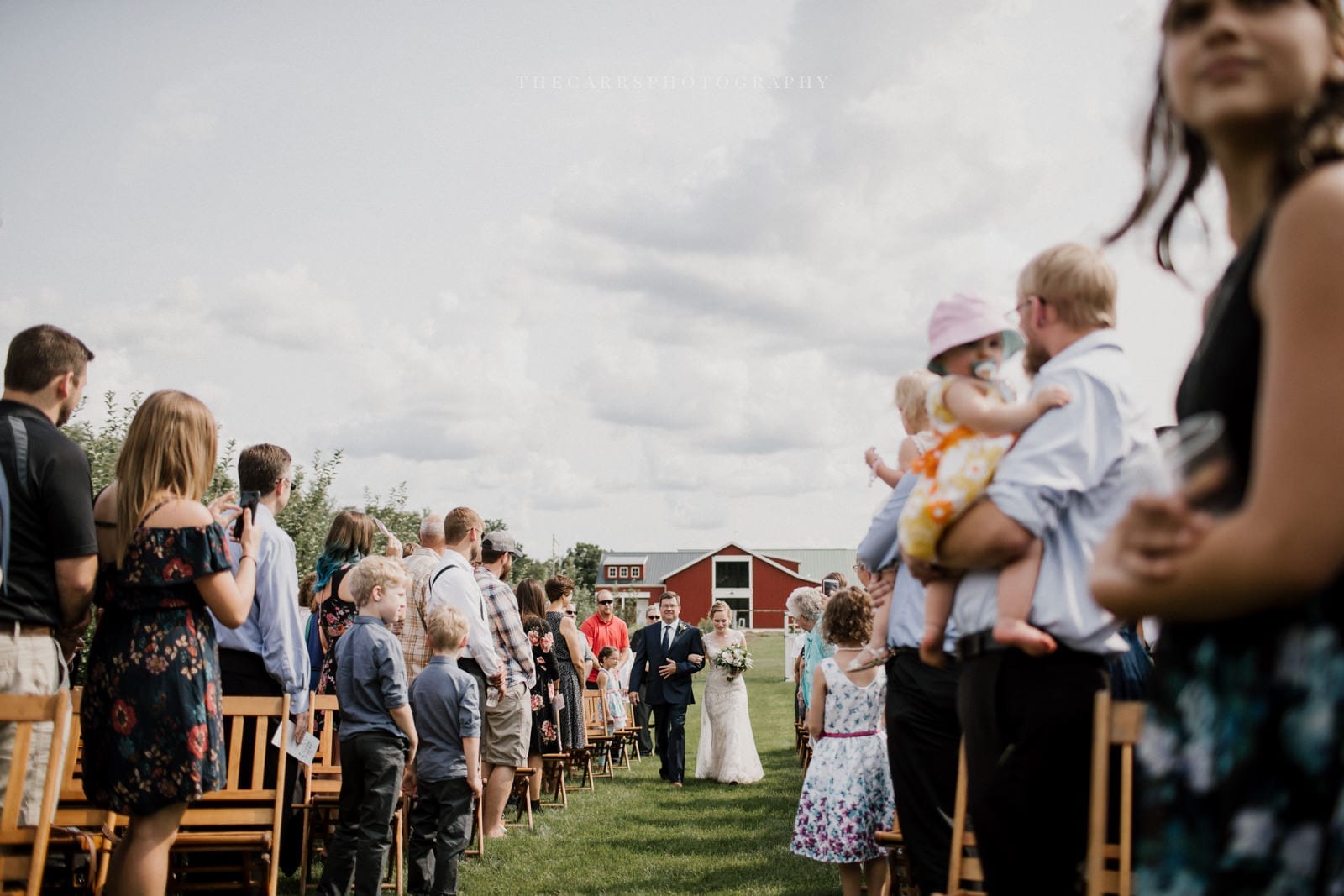 father walks bride down the aisle at Eckers Apple Farm Wedding - Destination Photographer