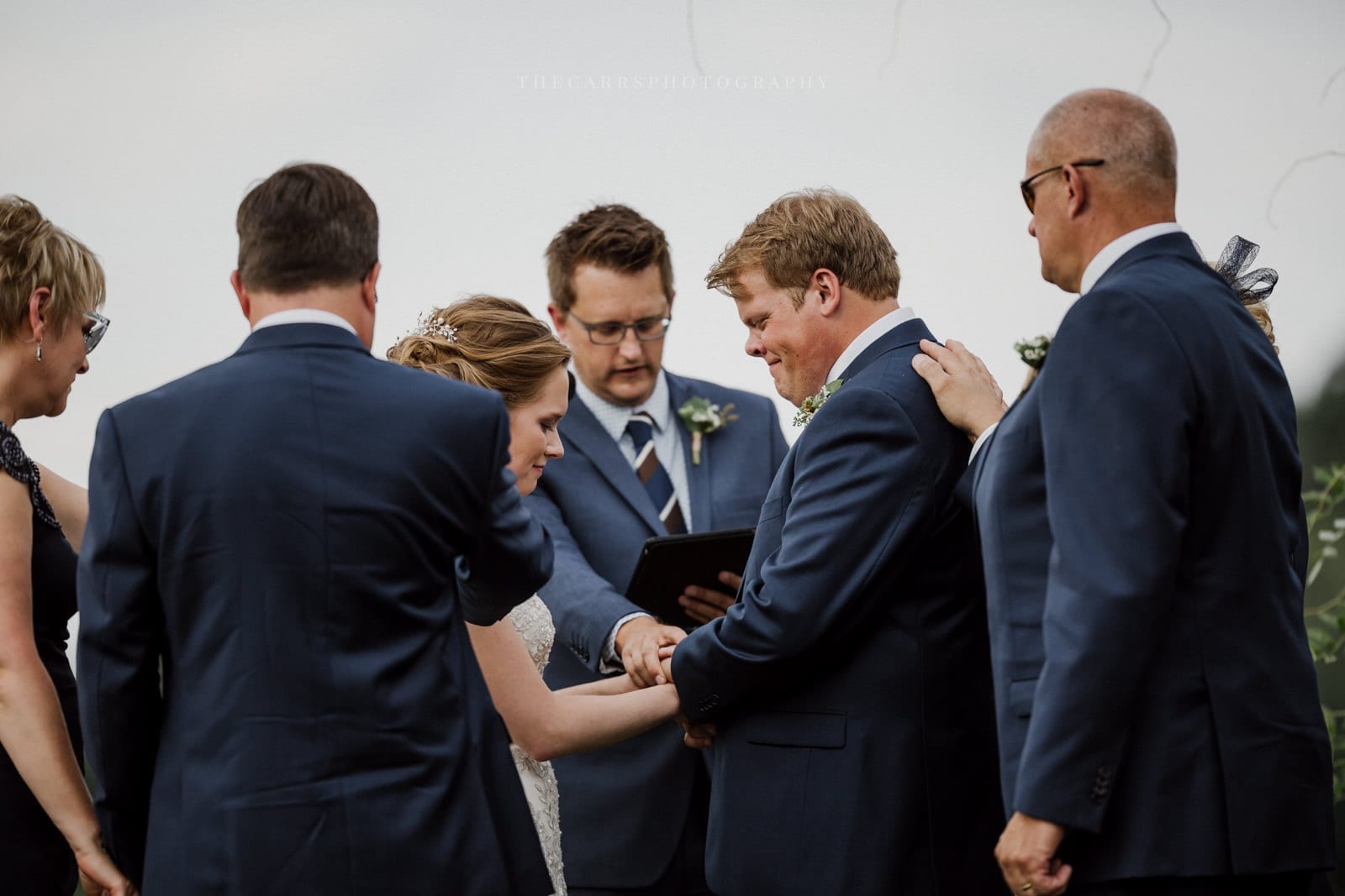 bride and groom praying at Eckers Apple Farm Wedding - Destination Photographer