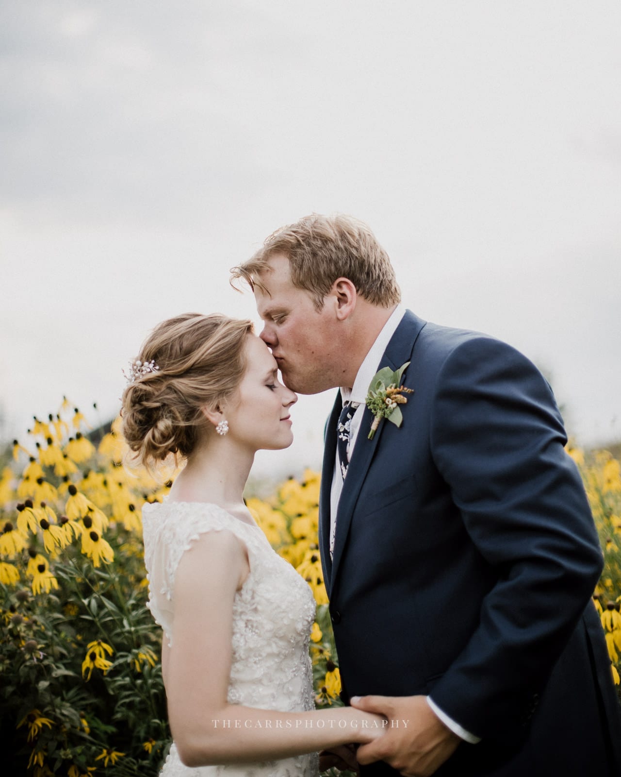 groom kisses bride's forehead at Eckers Apple Farm Wedding - Destination Photographer
