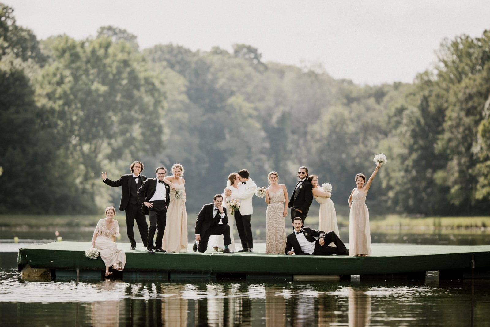bridal party on lake dock at lake house wedding - Akron Ohio Wedding Photographer