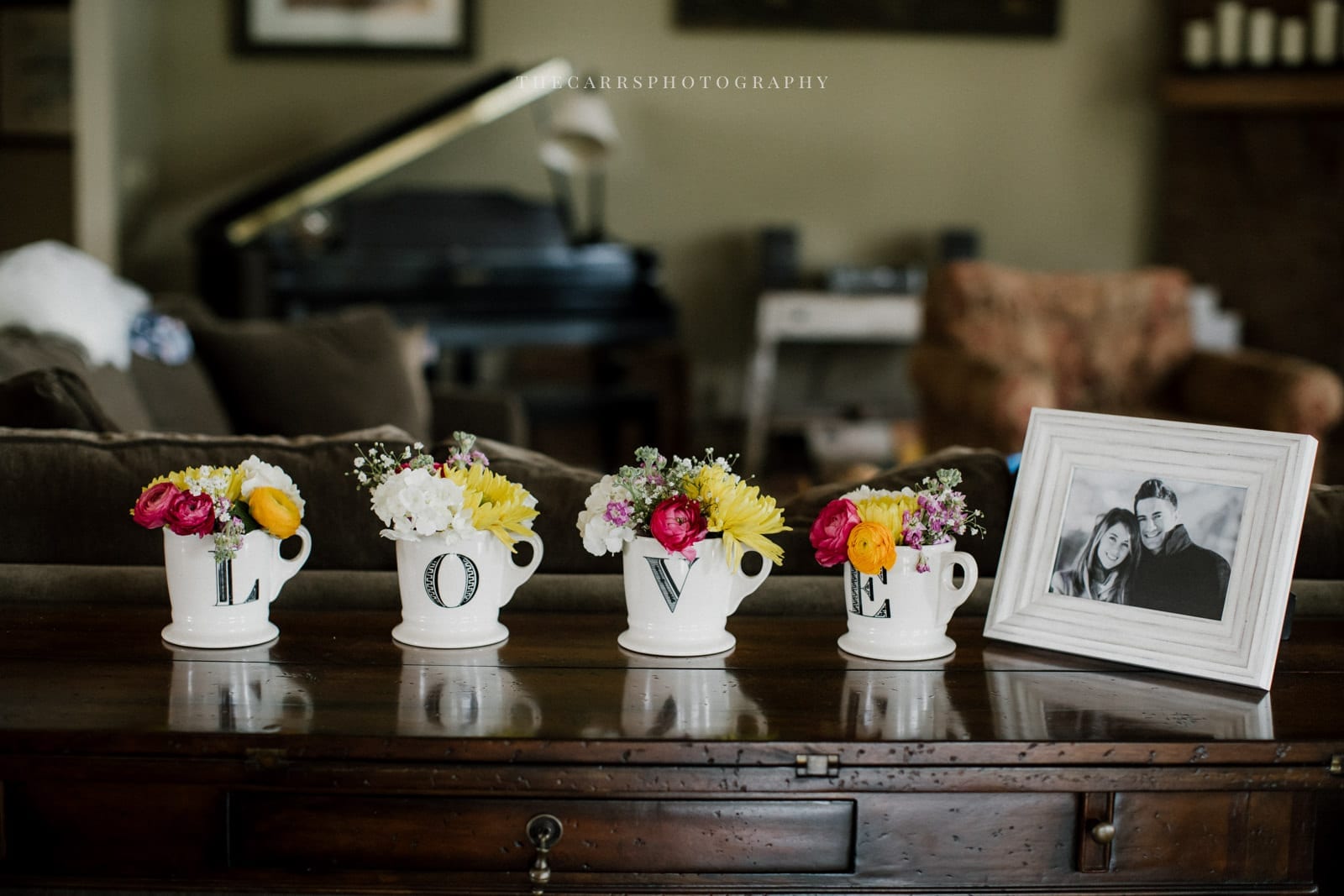 love tea cup flower vases and picture at lake house wedding - Akron Ohio Wedding Photographer