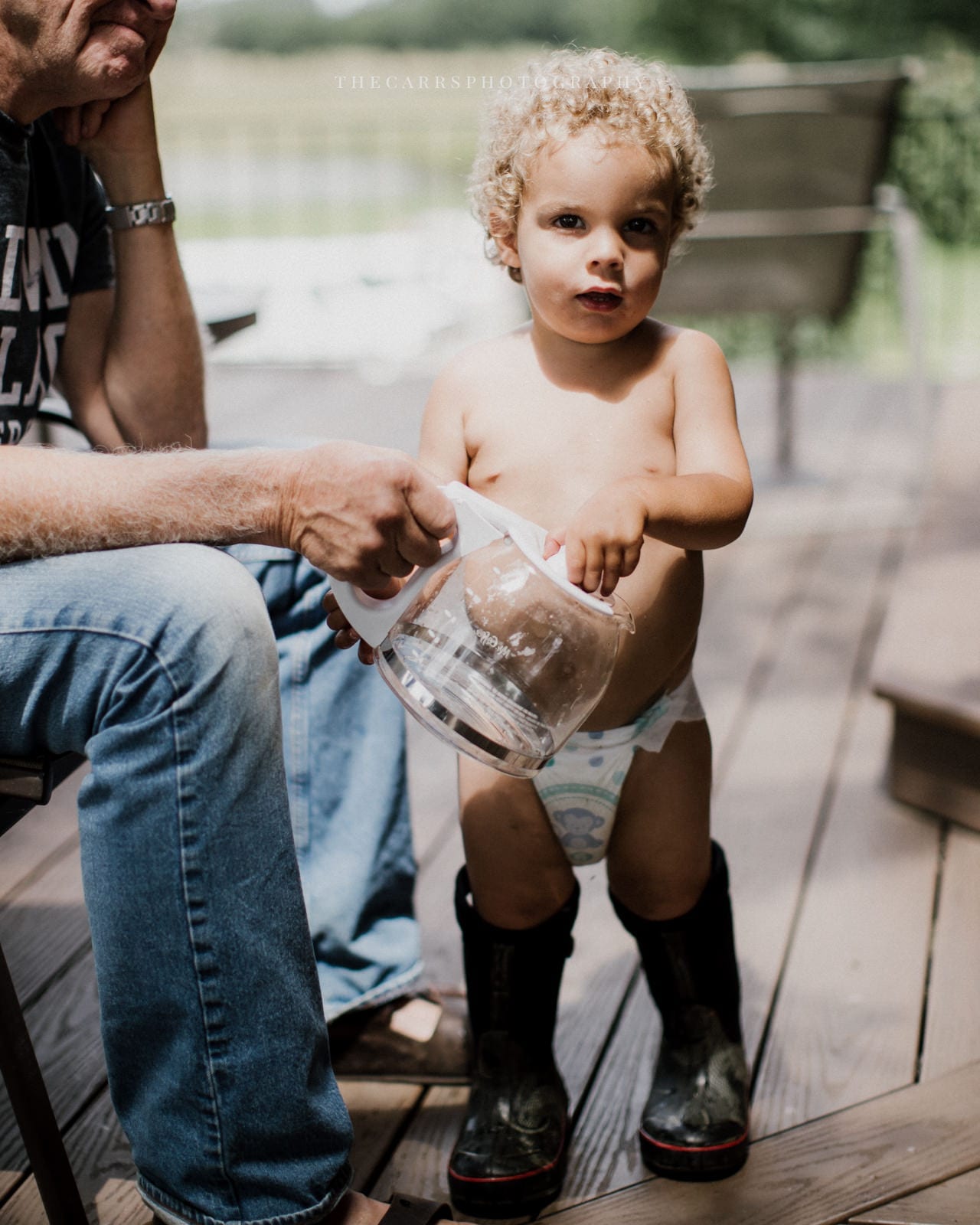 baby in diaper and boots at lake house wedding - Akron Ohio Wedding Photographer