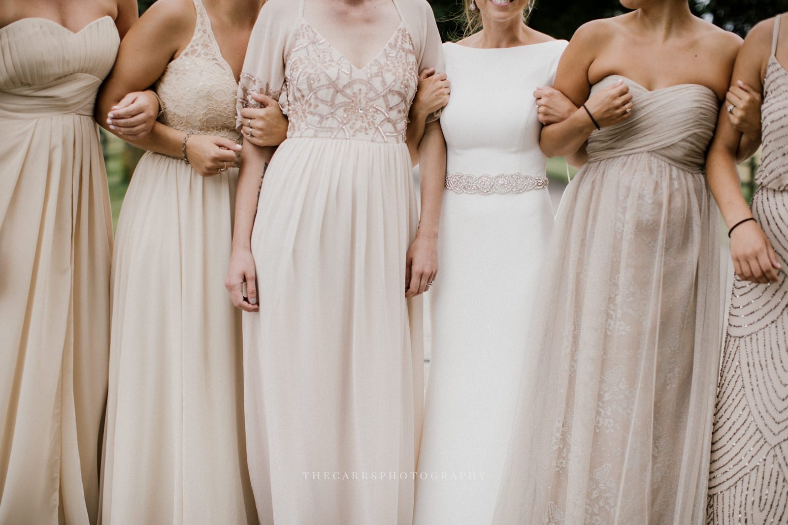 bride and bridesmaids dress details at lake house wedding - Akron Ohio Wedding Photographer