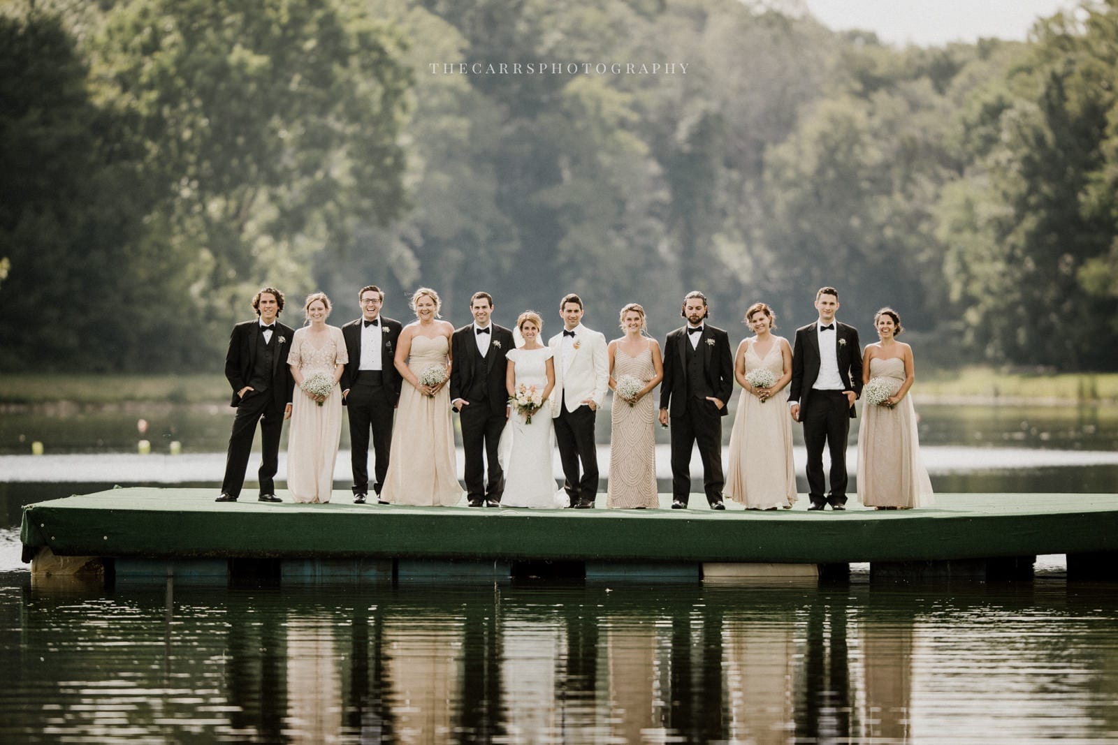 bridal party on lake dock at lake house wedding - Akron Ohio Wedding Photographer