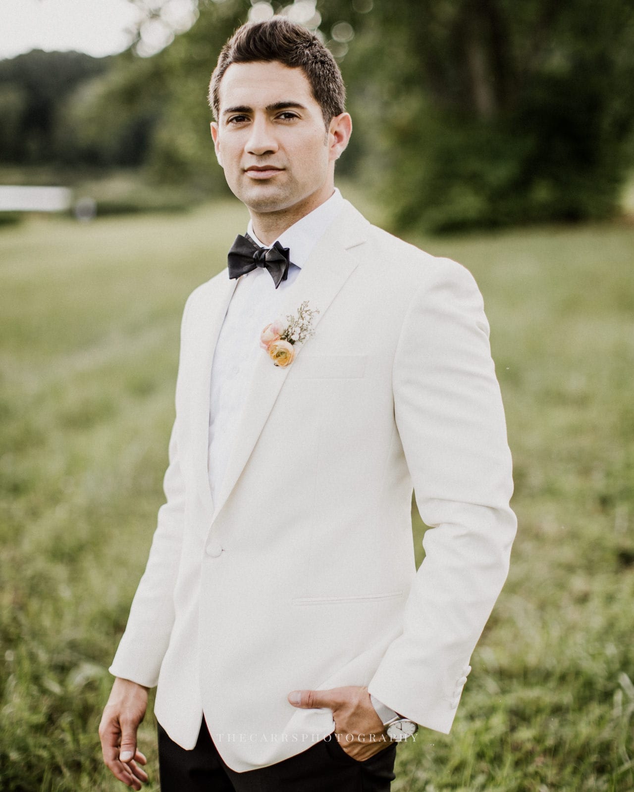 groom serious at lake house wedding - Akron Ohio Wedding Photographer