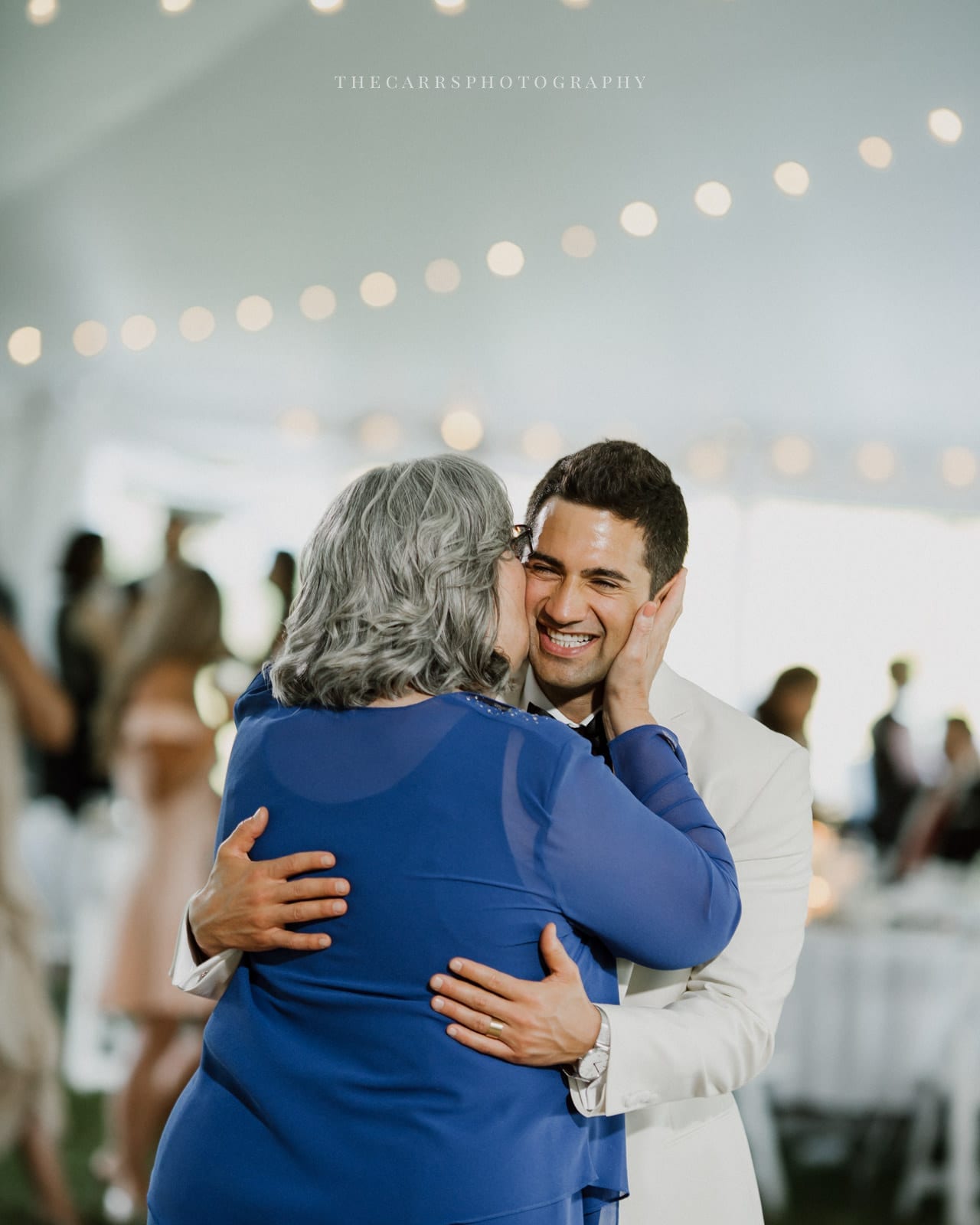 mom kisses groom at lake house wedding - Akron Ohio Wedding Photographer