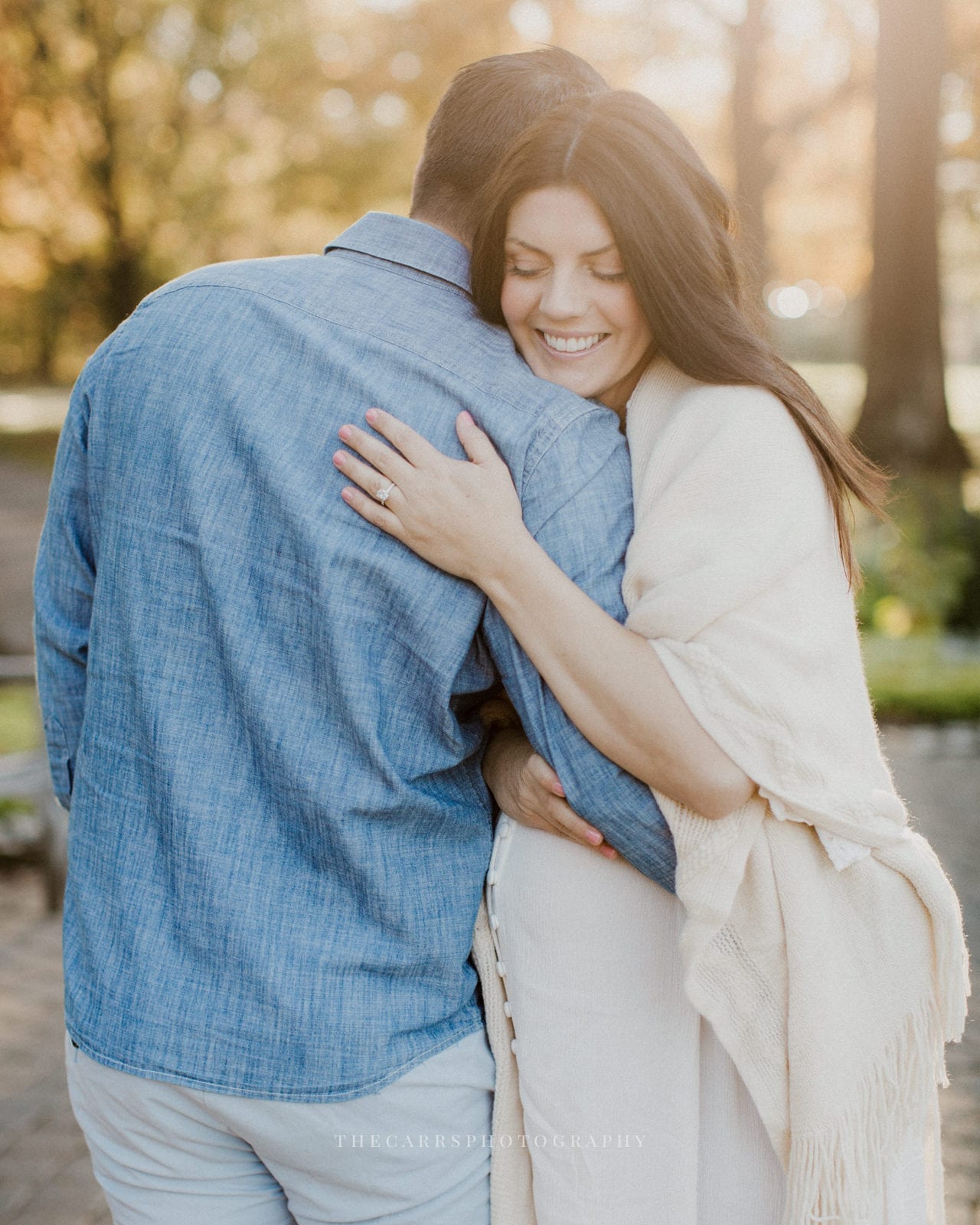 couple embraces - dayton ohio maternity photographer