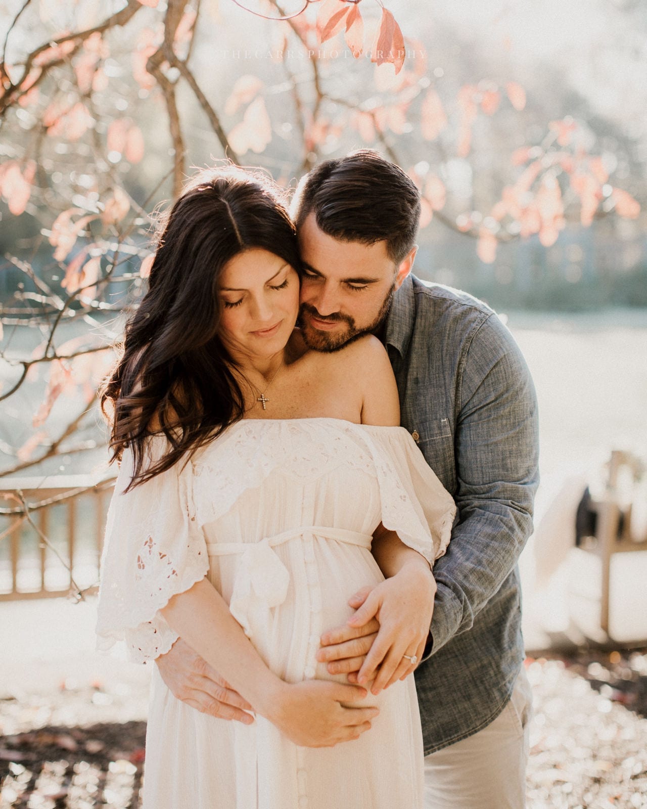 man and woman embrace - dayton ohio maternity photographer