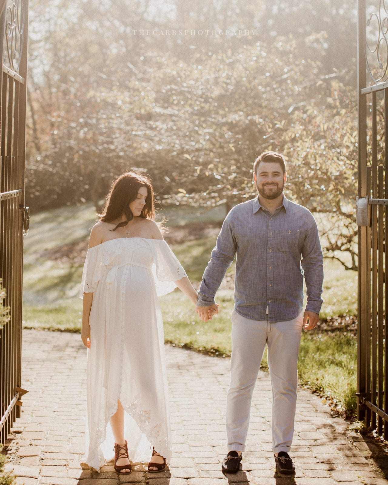 husband and wife holding hands - dayton ohio maternity photographer
