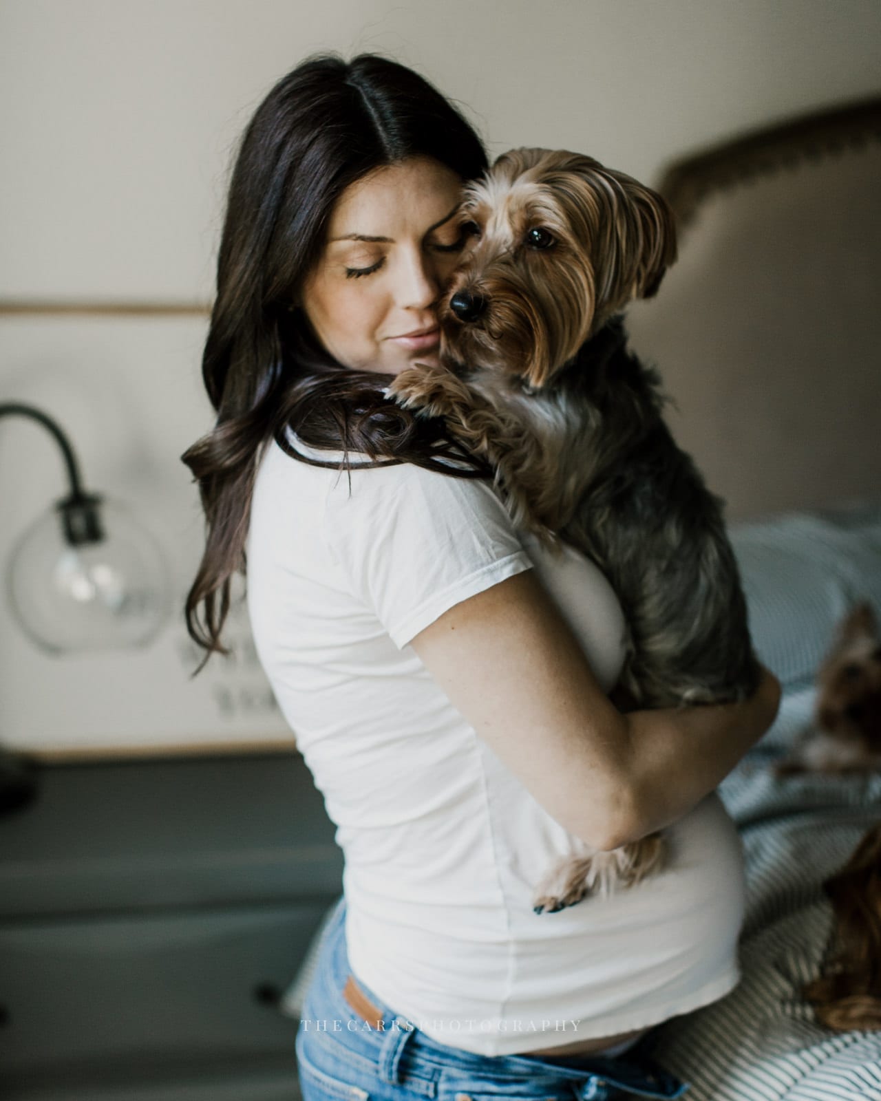 wife holding dog - dayton ohio maternity photographer