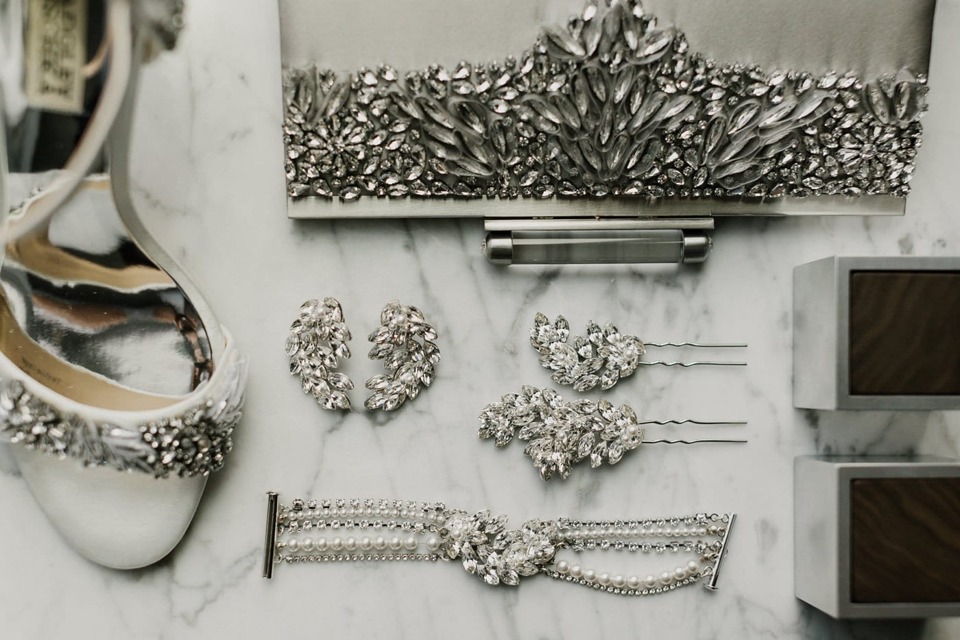 close up of brides jewelry and shoes at Juniper Rooftop Wedding