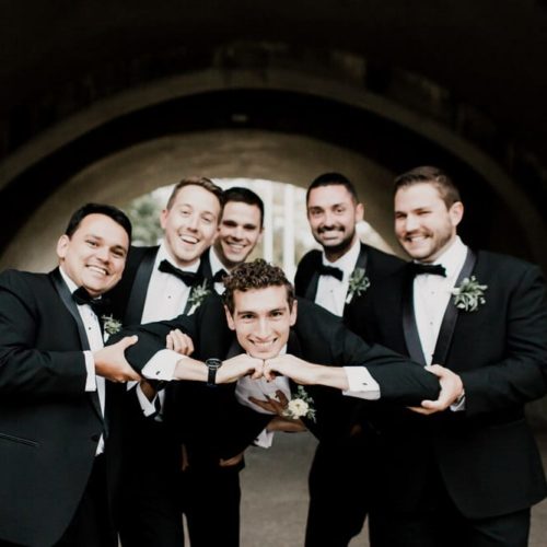 groomsmen holding up groom by Dayton Ohio Photographer Kera Estep