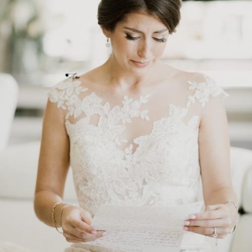 Bride Cries as she reads note from groom by Dayton Ohio Photographer Kera Estep