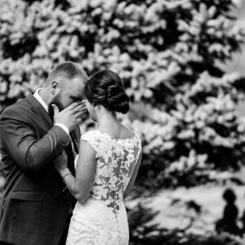 Groom cries as he sees his bride for the first time by Dayton Ohio Photographer Kera Estep