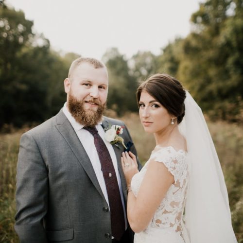 Bride and groom posing together by Dayton Ohio Photographer Kera Estep