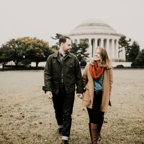 Engaged Couple smiles and walks in Washington DC by Dayton Ohio Photographer Kera Estep