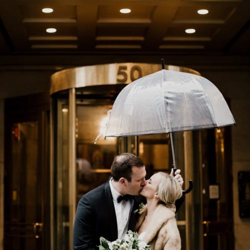 Bride and Groom Kiss Outside Columbus Hotel by Dayton Ohio Photographer Kera Estep