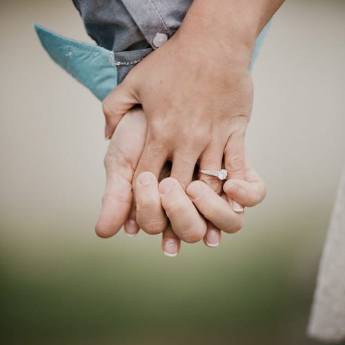 close up of couple holding hands by Dayton Ohio Photographer Kera Estep