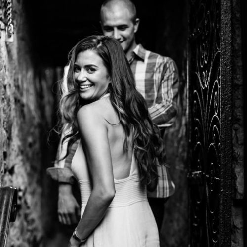 couple laughs in doorway by Dayton Ohio Photographer Kera Estep