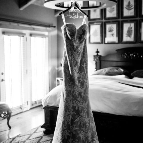 wedding dress hands from chandelier by Dayton Ohio Photographer Kera Estep