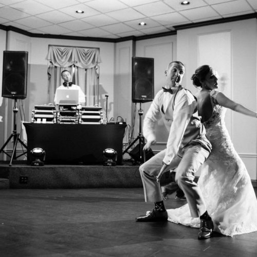 bride and groom doing funny dance by Dayton Ohio Photographer Kera Estep