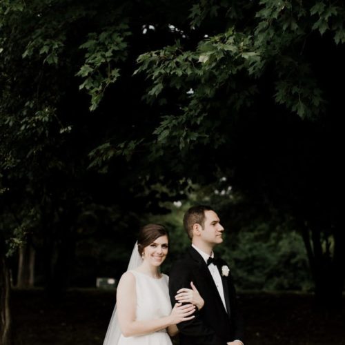bride and groom embracing under a tree by Dayton Ohio Photographer Kera Estep