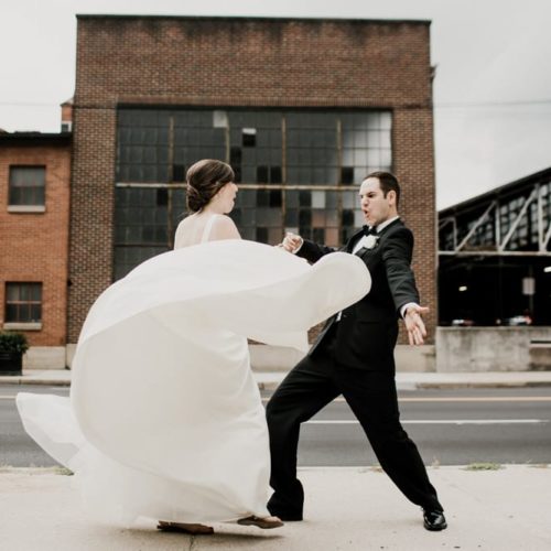 bride and groom dancing in the street by Dayton Ohio Photographer Kera Estep