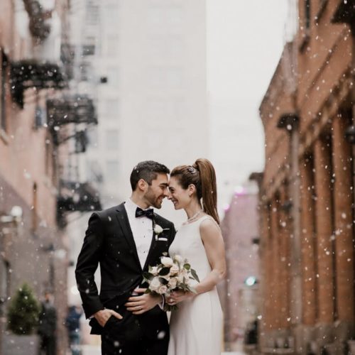 bride and groom in snow by Michael Carr Ohio Wedding and Engagement Photographer