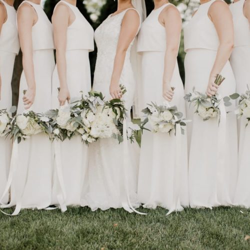 bride and bridal party holding flowers by Michael Carr Ohio Wedding and Engagement Photographer