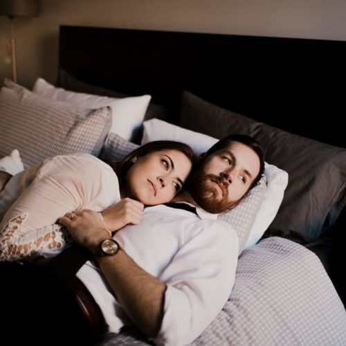 couple on bed Michael Carr Ohio Wedding and Engagement Photographer