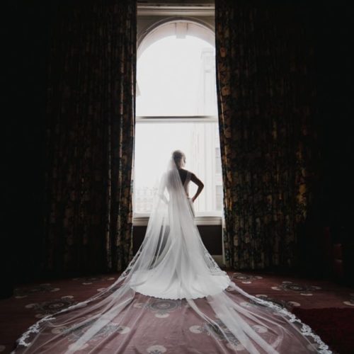 bride in front of window by Michael Carr Ohio Wedding and Engagement Photographer