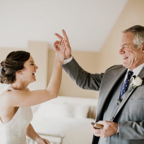 bride and dad high five by Michael Carr Ohio Wedding and Engagement Photographer