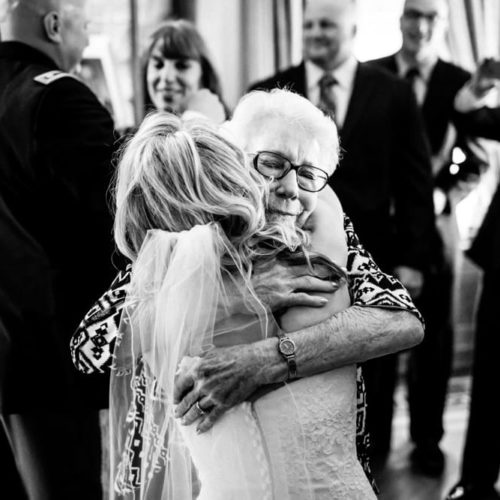 bride embracing grandmother by Michael Carr Ohio Wedding and Engagement Photographer
