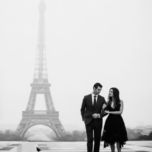 couple walking in front of Eiffel tower by Michael Carr Ohio Wedding and Engagement Photographer