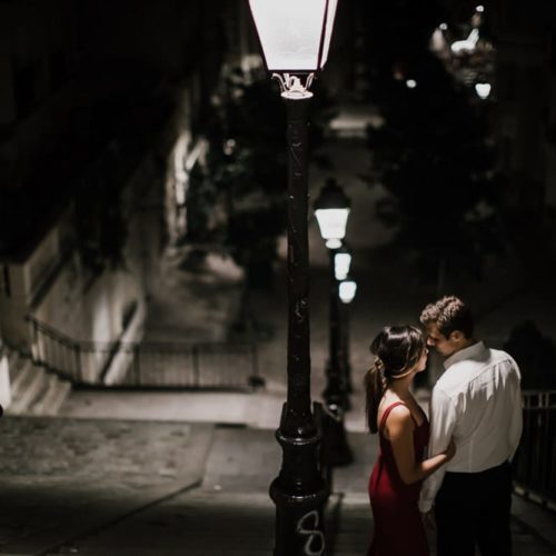 couple kissing under streetlamp by Michael Carr Ohio Wedding and Engagement Photographer