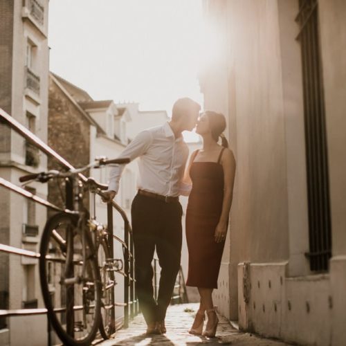 couple kissing in Paris street by Michael Carr Ohio Wedding and Engagement Photographer