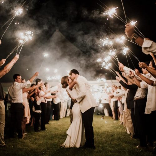 bride and groom kissing in sparklers by Michael Carr Ohio Wedding and Engagement Photographer