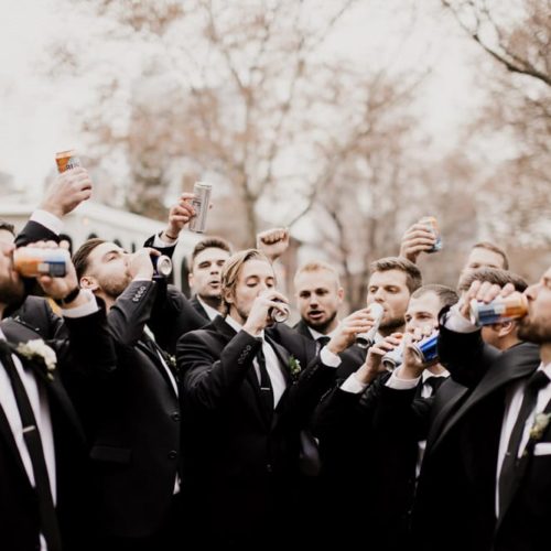 groom and groomsmen drinking by Alex Grodkiewicz Dayton Ohio Wedding and Engagement Photographer