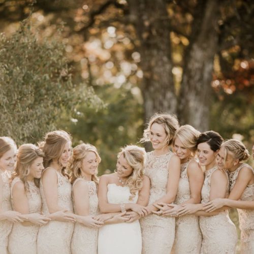 bride and bridesmaids embracing by Dayton Ohio Wedding Photographer Josh Ohms