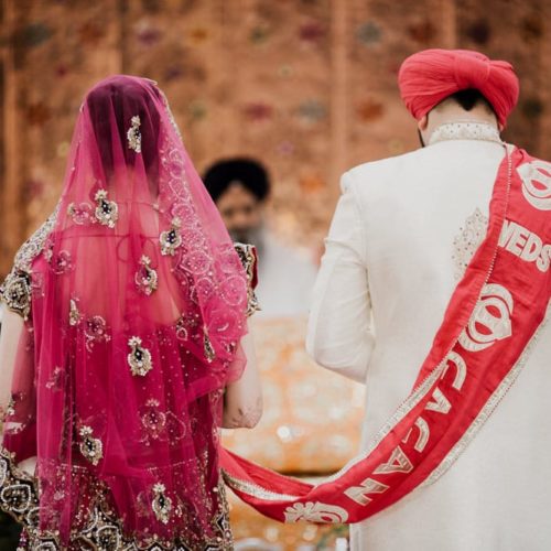 bride and groom during traditional Indian wedding ceremony by Dayton Ohio Wedding Photographer Josh Ohms