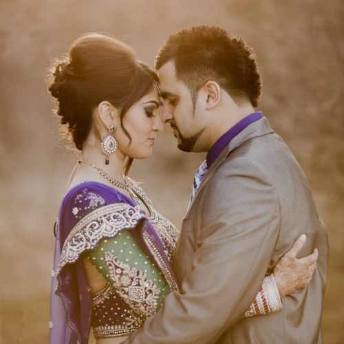 bride in sari with embracing groom by Dayton Ohio Wedding Photographer Josh Ohms