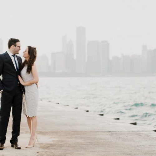 couple embracing on Chicago pier by Dayton Ohio Wedding Photographer Josh Ohms